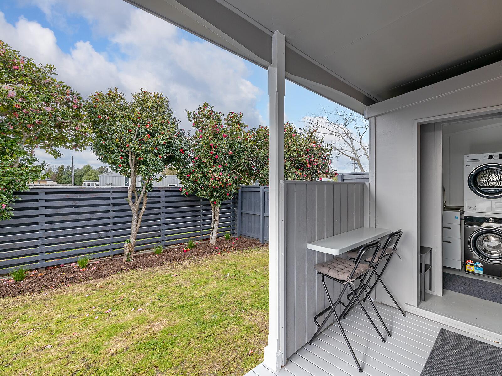 Your own gate, covered deck and front door